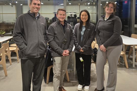 four members of GBLS team standing for photo
