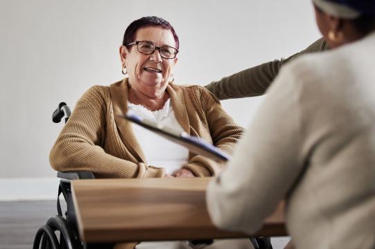 Older adult meeting with an advocate